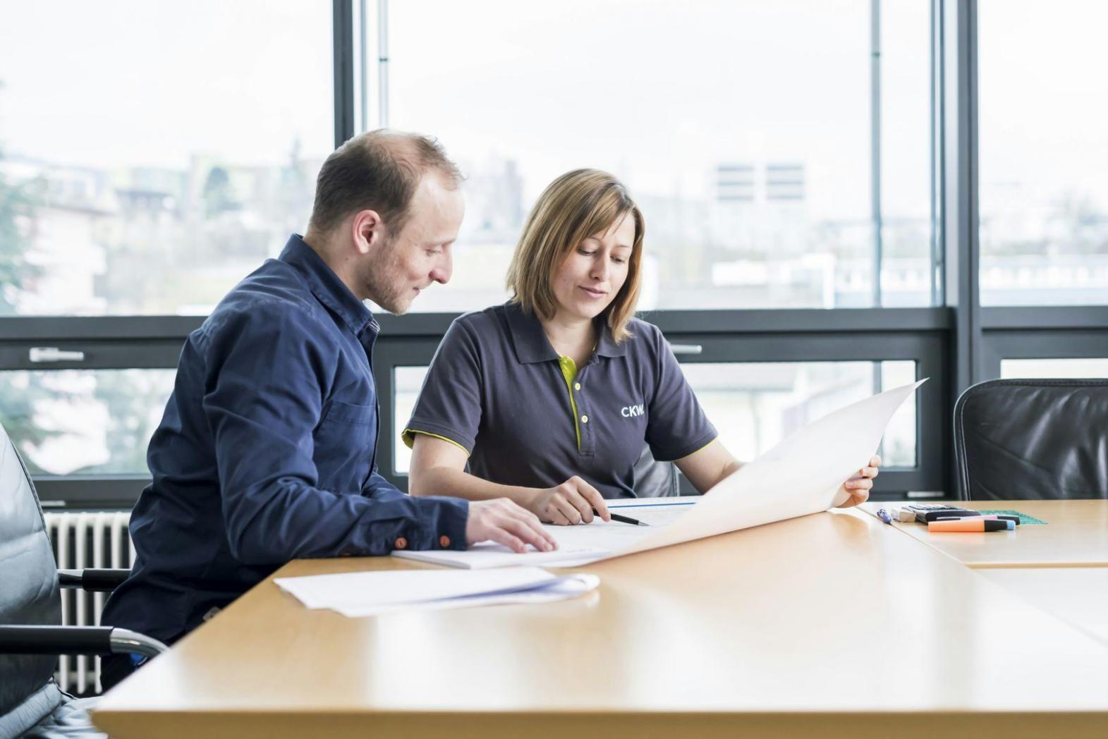 Collaborative financial planning session with Australian business owner